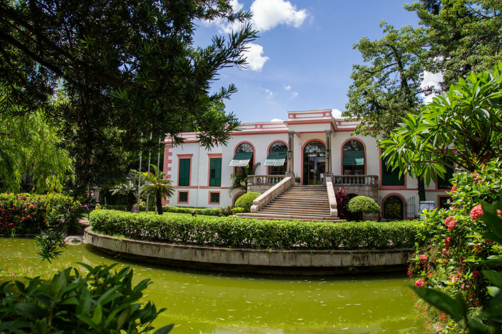 Right view of the exterior with trees as the foreground of the Casa Garden Building