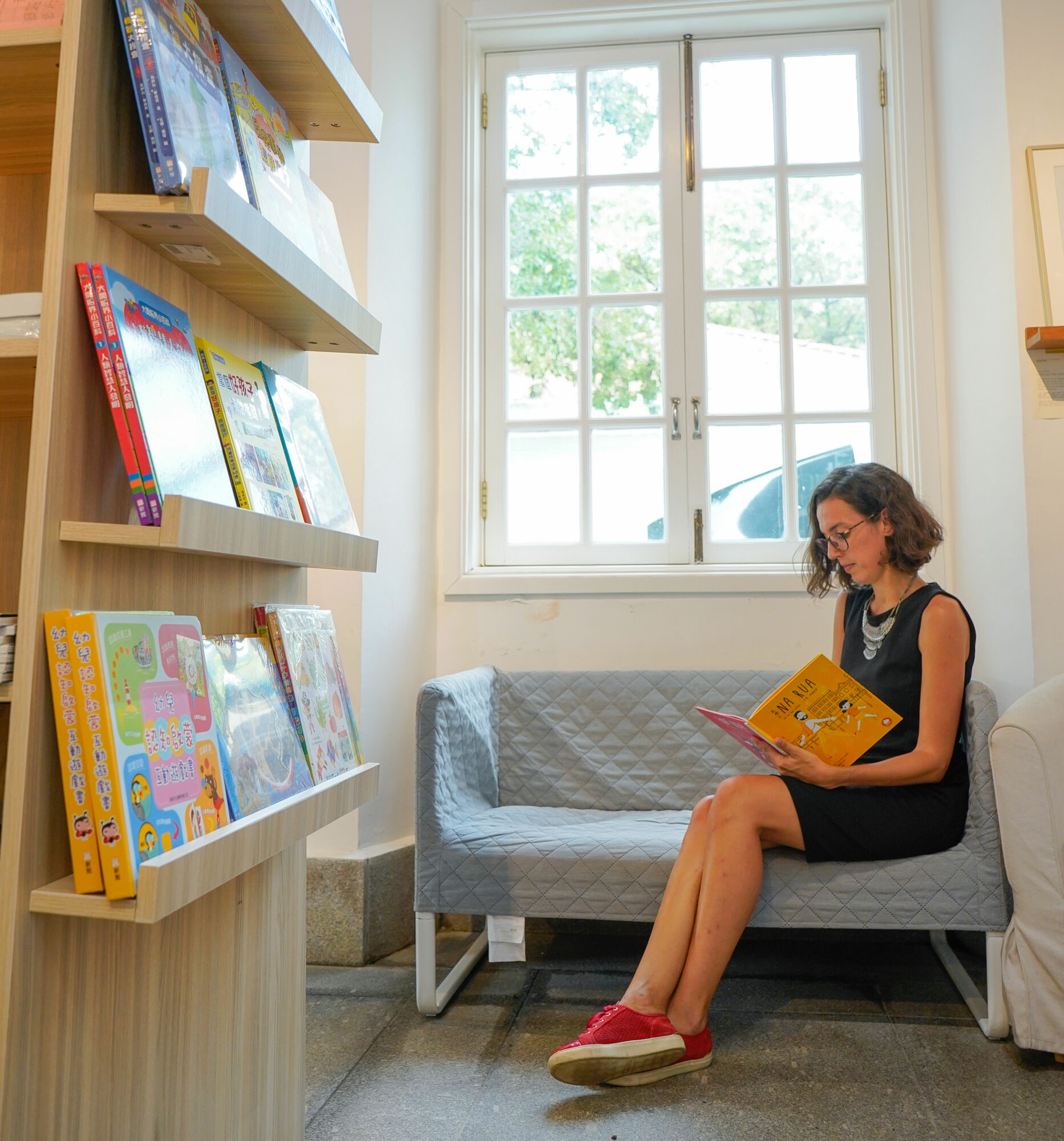 Catarina Mesquita Mandarina Books Seating with a Book in Hand