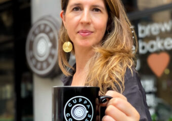 Cristiana Figueiredo from Cuppa Coffee with Coffee Cup in Hand Photo Credits Cassia Schutt