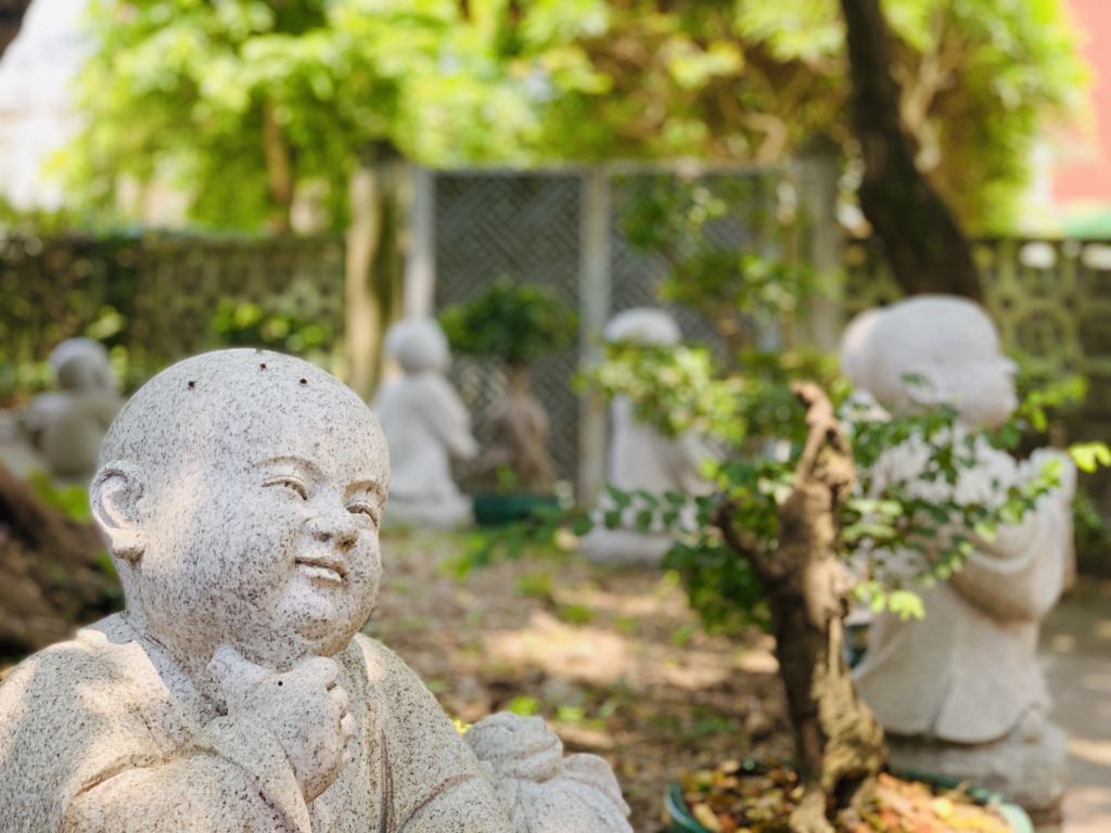 Kun Iam Temple Garden Buddhas Close Up