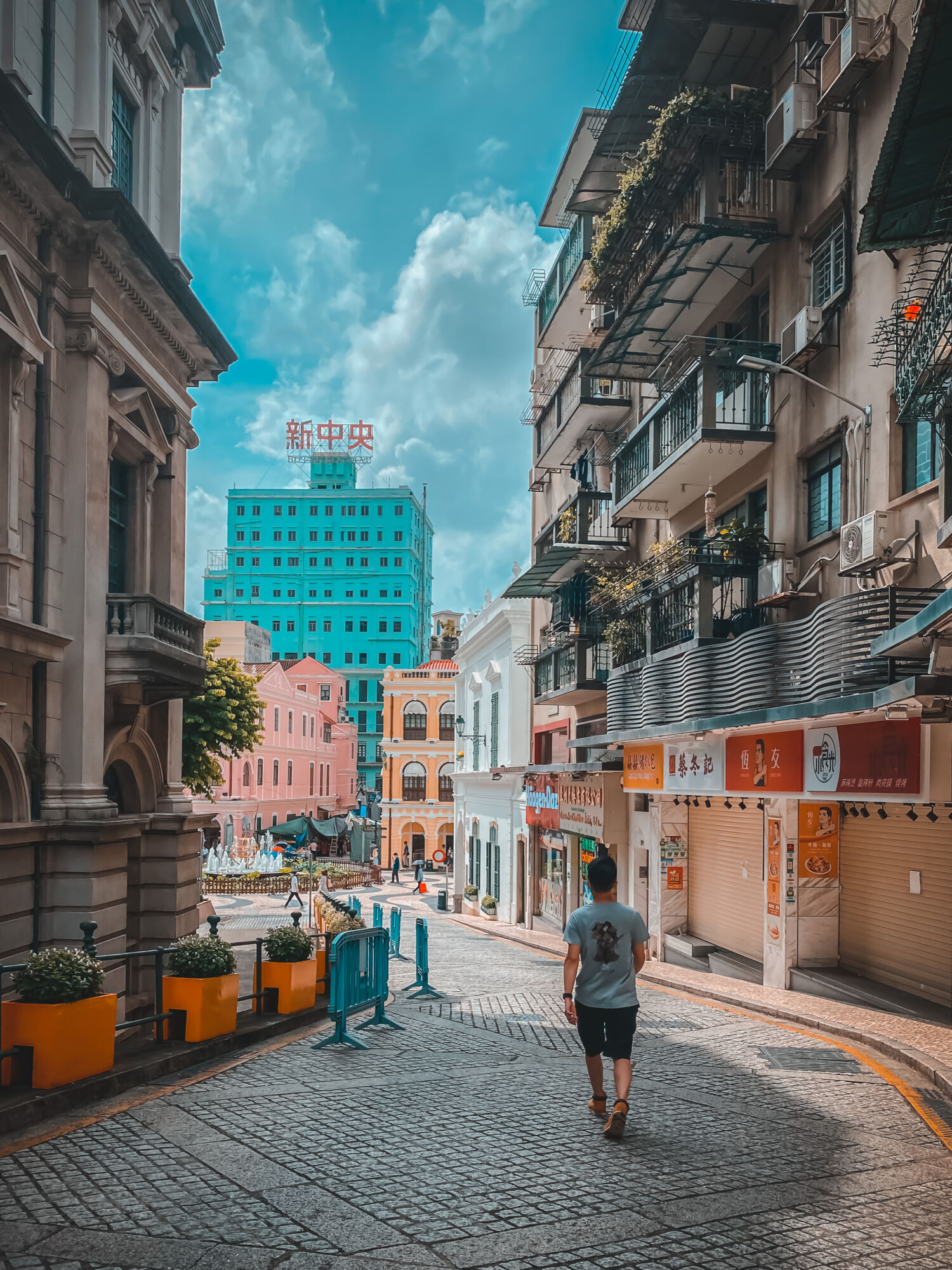 Korlouyeah walking on an empty taipa village street during covid pandemic